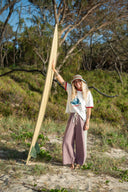 Model wearing the Atmosea Crochet Hat outdoors in a coastal setting.