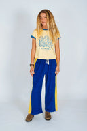 Front view of the Atmosea Dressing Mermaids Artist Cap Sleeve Tee.