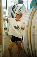 Lifestyle photo of the Atmosea Get Barrelled Artist Tee.