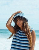 Atmosea Horizon Crochet Hat featuring colorful hand-crocheted cotton stripes and a wide brim for sunny beach days.