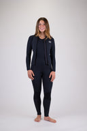 A woman wearing the Atmosea Luna Wetsuit Zip Up Jacket in front of a white background.