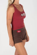 Close-up of the Inner Relm Checkers Top highlighting the vintage-inspired chest graphic and ribbed fabric.