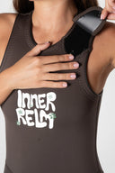 Close-up of the Inner Relm Drop Knee Long Jane 2mm shoulder closure with snap-button fastening.