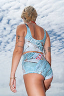 Close-up of the Salt Gypsy Punchy Surf Bikini Top in the Oceania print highlighting the supportive fit and recycled fabric.
