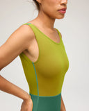 Side view of the Seea Lido One Piece in Tropical Green highlighting the high neckline.