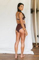Back view of model wearing Island Bikini Bottom in Cold Brew