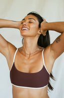 Up close of model wearing River Bikini Top in Cold Brew