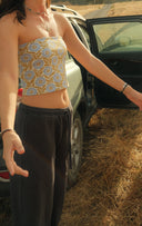 Close-up of the Sisstr La Playa Knit Tube Top showing the knit texture and fit.