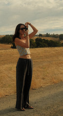 Model wearing the Sisstr La Playa Knit Tube Top outdoors.
