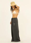 Side profile of the Sisstr Seaside Fleece Pant showing the relaxed wide-leg fit.