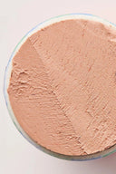 Close-up of the top of the SurfDurt Mineral Sunscreen SPF 30 Push-Pop Sun Stick in Medium.