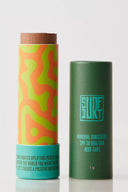 SurfDurt Mineral Sunscreen SPF 30 Push-Pop Sun Stick in Medium with colorful biodegradable packaging.